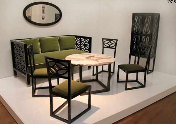 Glass cabinet, bench, chairs & mirror (c1904) by Koloman Moser & made by Wiener Werkstätte plus round table (c1902) by Josef Hoffmann at Leopold Museum. Vienna, Austria.