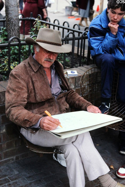 Artist drawing on Melbourne Mall. Melbourne, Australia.