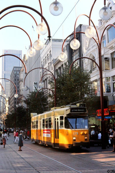 Streetcar runs under lights hanging along Melbourne Mall. Melbourne, Australia.
