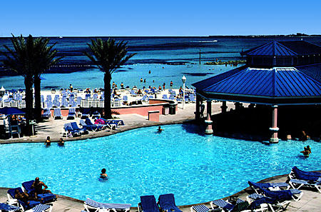 Pool & ocean of Radisson Resort on Cable Beach. The Bahamas.