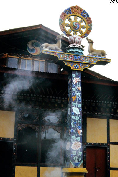Pole with religious symbols in front of Drubtho Gonpa nunnery in Thimpu. Bhutan.