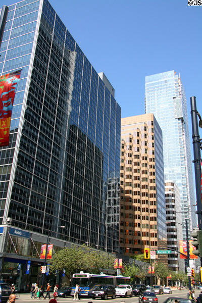 Streetscape along West Georgia from Burrard with Living Shangri-La skyscraper. Vancouver, BC.