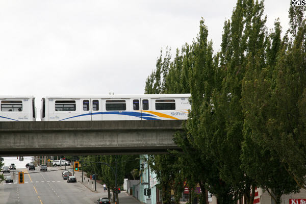 SkyTrain crosses over street. New Westminster, BC.