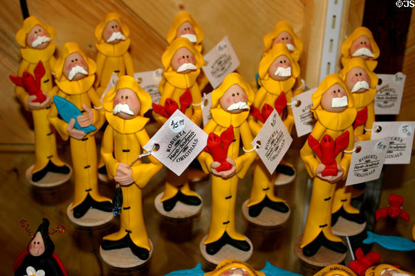 Souvenir slim humorous fishermen statues at Hudson Oddities. NB.
