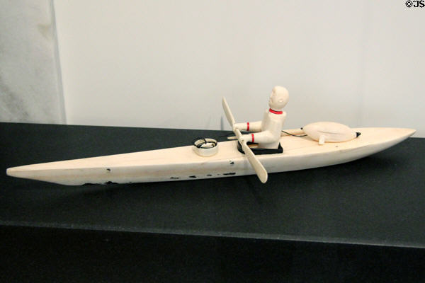 Inuit ivory carving of man in Kayak (c1900-60) at National Gallery of Canada. Ottawa, ON.