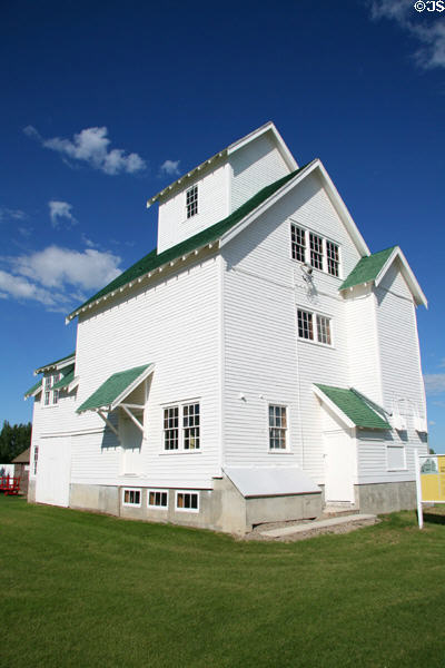 Seed cleaning elevator typical of prairie agricultural architecture at Doc's Town. Swift Current, SK.