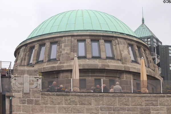 Detail of carvings on domed building at St Pauli Pier. Hamburg, Germany.