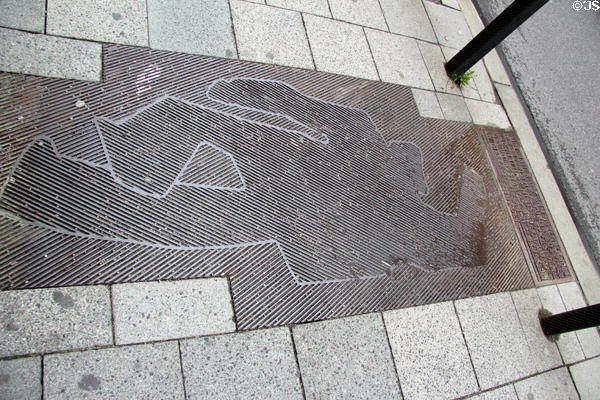 Sidewalk plaque outlining body of assassinated journalist & Head of Peoples' State of Bavaria, Kurt Eisner on Feb. 21, 1919 by a far-right nationalist. Munich, Germany.