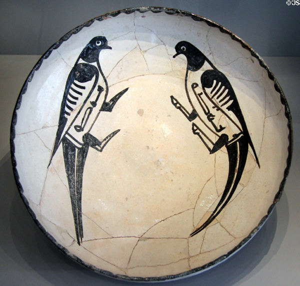 Earthenware dish painted with two birds (11thC) from Iran at Pergamon Museum. Berlin, Germany.