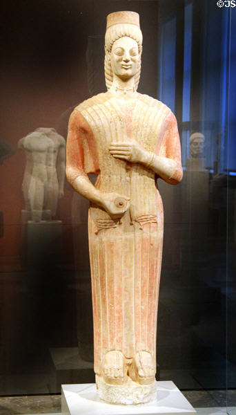 Attican, Greek marble funerary statue of woman in red dress (580-560 BCE) (so-called Berlin Goddess) at Altes Museum. Berlin, Germany.