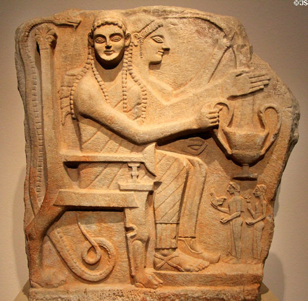 Spartan, Greek marble relief with Heroes & Worshippers (540 BCE) at Altes Museum. Berlin, Germany.