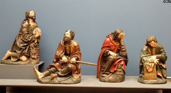 Carved linden wood figures of Christ on Mount of Olives with sleeping Apostles Peter, James the Elder & John (c1515) by Meister von Rabenden from Munich at Bode Museum. Berlin, Germany.