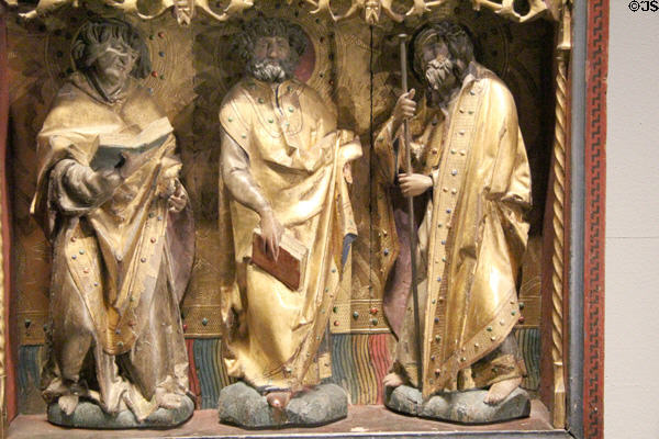 Detail of three Apostles on wing of Mass of St Gregory altarpiece (c1525) at Aachen Cathedral Treasury. Aachen, Germany.