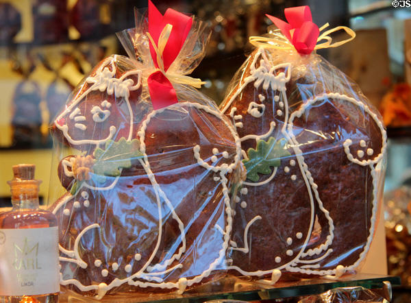 Pair of chocolate squirrels in store window. Aachen, Germany.
