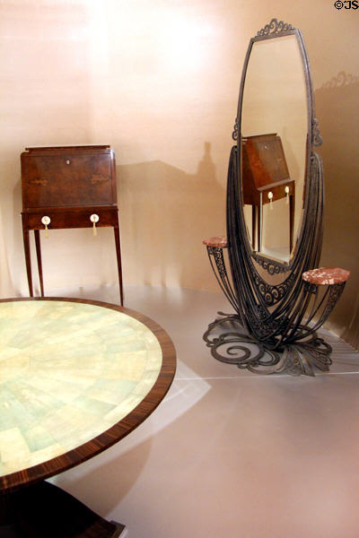 Standing Mirror (1920-25) by Edgar Brandt; Lady's Secretary (1922-23) by Jacques-Émile Ruhlmann; Salon Table (c1930) by Jules Leleu, Paris at Hamburg Decorative Arts Museum. Hamburg, Germany.