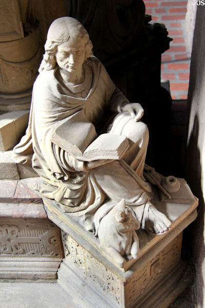 Evangelist Luke statue on base of pulpit at Trier Cathedral. Trier, Germany.