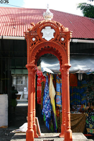 Keep the Pavement Dry monument in old market plaza opposite cruise dock. Roseau, Dominica.
