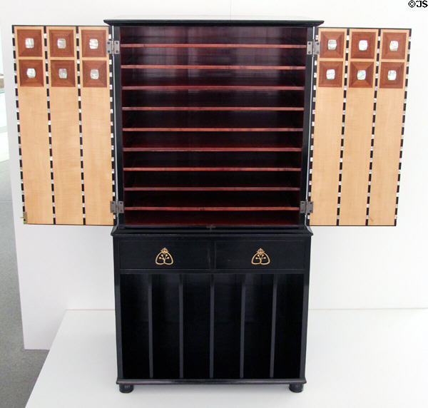 Music cabinet (1903-4) by Mackay Hugh Baillie Scott for Dresdner Werkstätten für Handwerkskunst of Dresden at Pinakothek der Moderne. Munich, Germany.