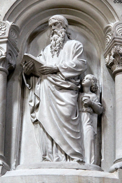 Evangelist St Matthew with Angel symbol carved on pulpit at Bamberg Cathedral. Bamberg, Germany.