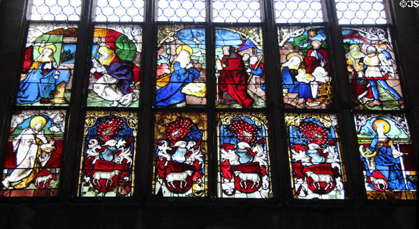 Stained glass window with Nativity scenes at St Lawrence Church. Nuremberg, Germany.