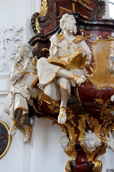 Details of Evangelists as humans on Baroque pulpit at Gößweinstein pilgrimage basilica. Gößweinstein, Germany.