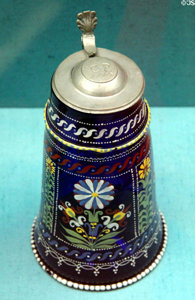 Dark blue glass tankard with pewter cover (17thC) from Bohemia at Germanisches Nationalmuseum. Nuremberg, Germany.