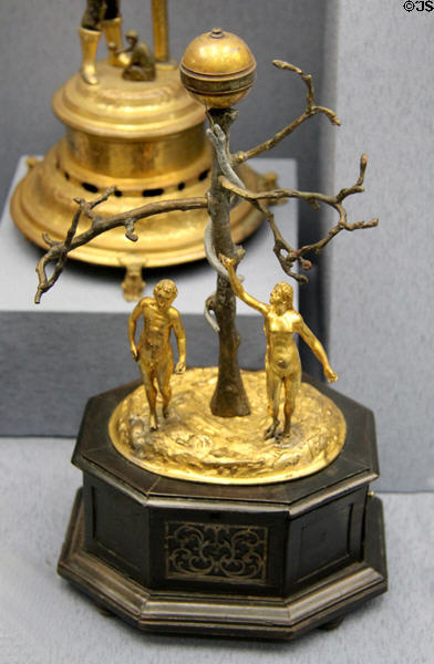 Table clock with Adam & Eve where snake's tongue points to time (c1600) from Nuremberg? at Germanisches Nationalmuseum. Nuremberg, Germany.