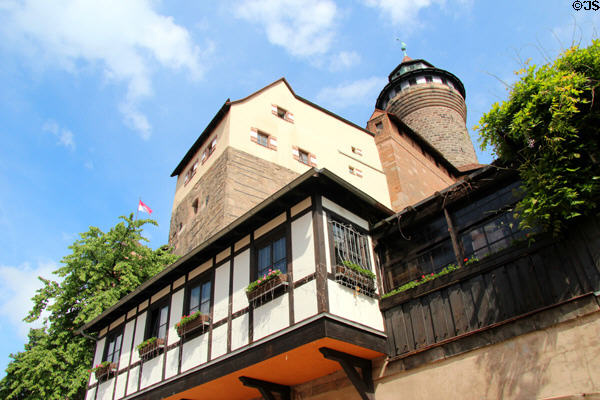 Galleries & buildings hang from Imperial Castle. Nuremberg, Germany.