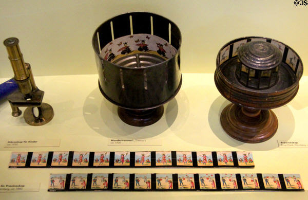 Child's microscope (c1930); Zoetrop (c1900) & Praxinoscope + its 'filmstrip' (c1880) at City Toy Museum. Nuremberg, Germany.
