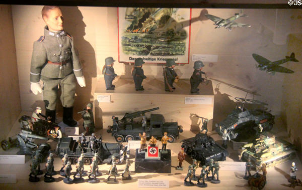 Toy German soldiers & weapons from WWII including figures of Hitler & other Nazis (1935-40) at City Toy Museum. Nuremberg, Germany.
