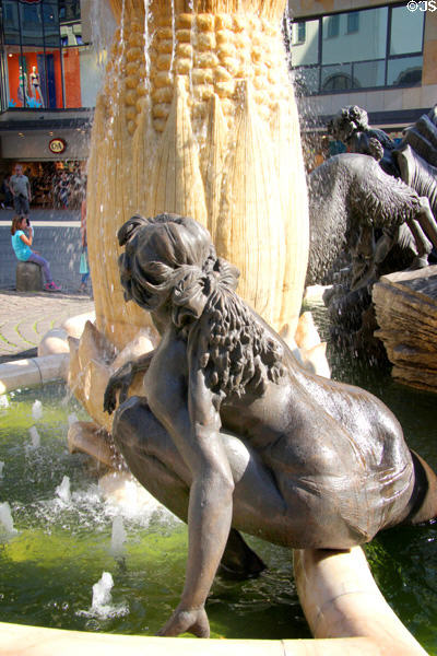 Sculpted young woman detail on Marriage Carousel sculpture. Nuremberg, Germany.