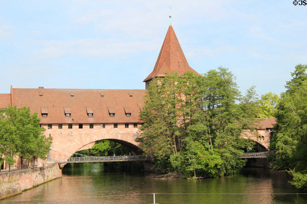 Fronveste & Schlayer Tower over Kettenteg suspension bridge & Pegnitz River. Nuremberg, Germany.