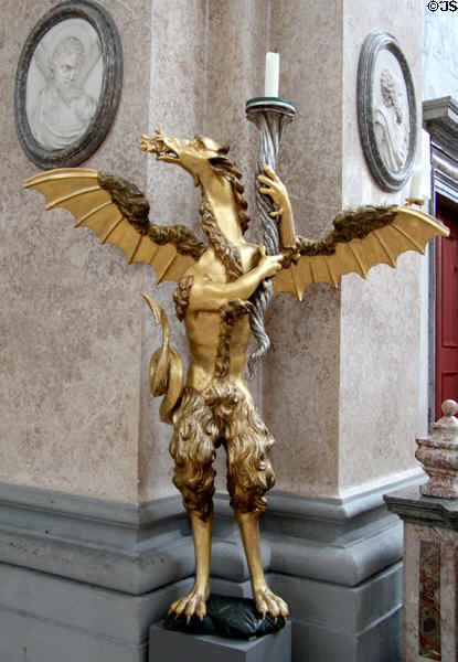 Winged dragon candle holder at Basilica St Mang. Füssen, Germany.