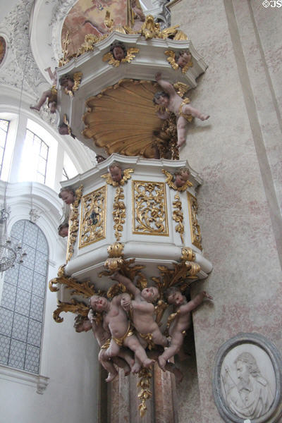 Baroque pulpit adorned with cherubs at Basilica St Mang. Füssen, Germany.