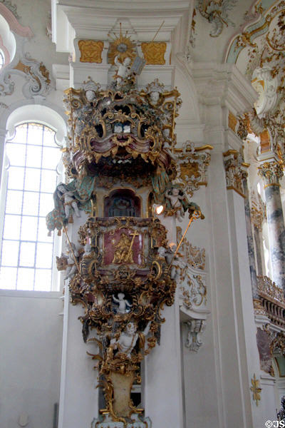 Baroque pulpit covered with putti at Wieskirche. Steingaden, Germany.
