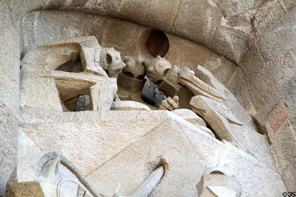 Gambling for coat of Christ on Passion Facade at Sagrada Familia. Barcelona, Spain.