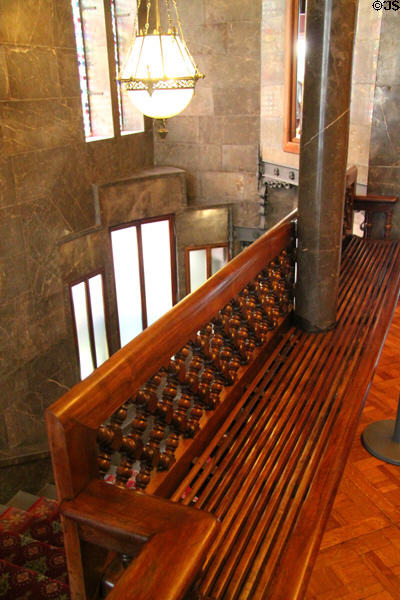 Built in bench by Gaudi at top of stairs up to main floor at Palau Güell. Barcelona, Spain.