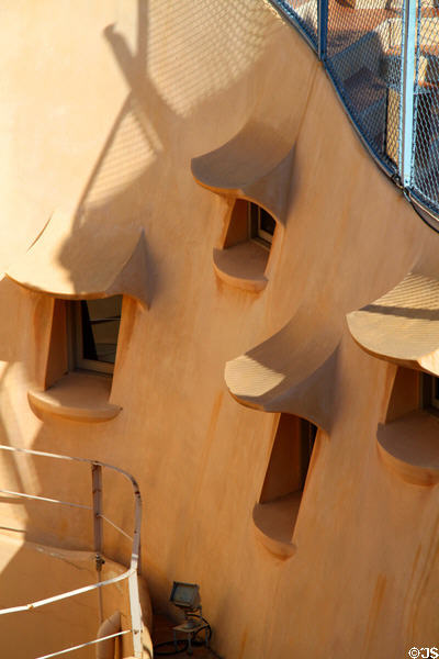 Central courtyard well windows seen from roof of Casa Milà. Barcelona, Spain.