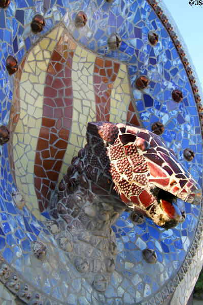 Lizard head plaque near steps of Parc Güell. Barcelona, Spain.