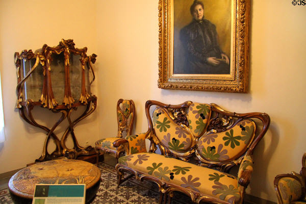 Modernista furniture designed by Aleix Clapés with advice of Gaudí at Gaudi House Museum in Parc Güell. Barcelona, Spain.