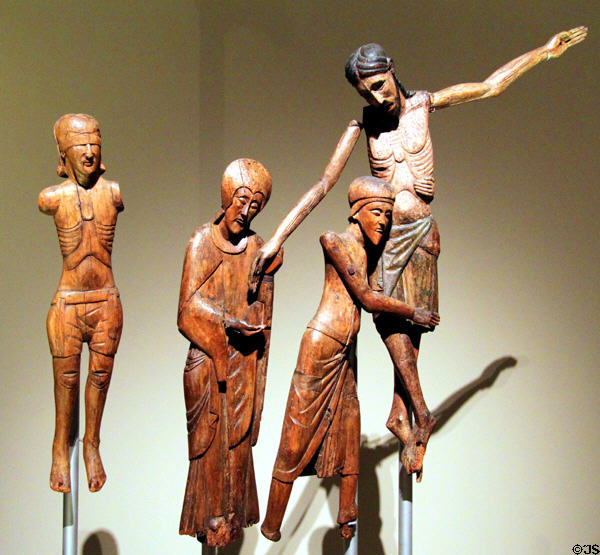 Wood carving of descent from cross from church of St Mary of Taüll (13thC) at Museu Nacional d'Art de Catalunya. Barcelona, Spain.
