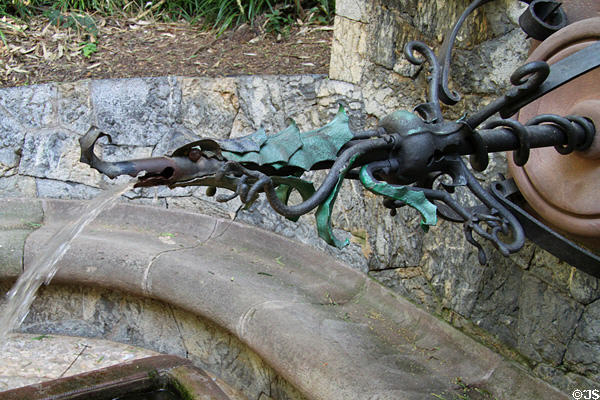 Detail of Gaudí's metalwork dragon for Font d'Hèrcules at Pedralbes Park. Barcelona, Spain.