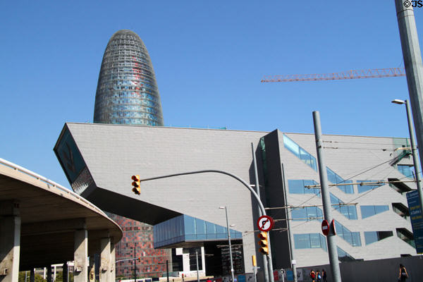 Torre Agbar over cantilevered neighbor building. Barcelona, Spain.