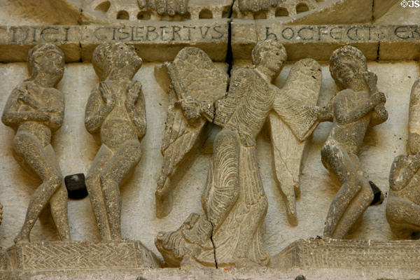 Detail of dead arising during Last Judgment on tympanum of Cathedral St Lazarre. Autun, France.
