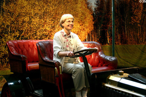 Visitors may photograph themselves in an antique car in Schlumpf National Automobile Museum. Mulhouse, France.