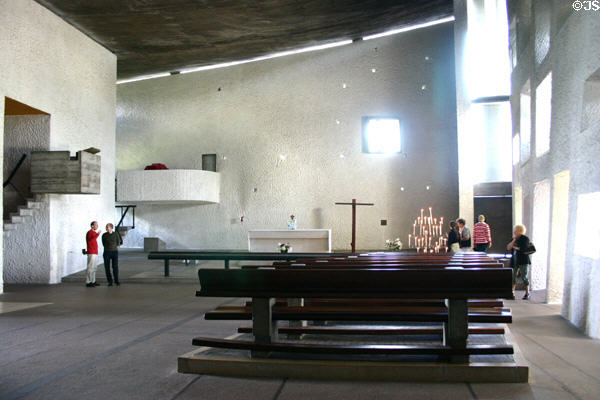 Pulpit, altar & pews of Notre Dame-du-Haut Chapel. Ronchamp, France.