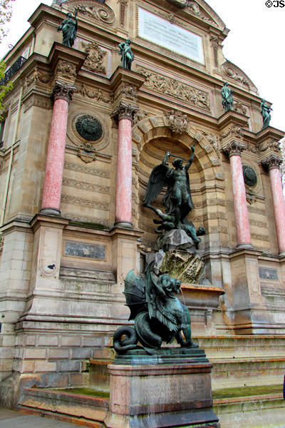 St-Michel Fountain designed in style of triumphal arch with optical illusion features to compensate for off-center position on square. Paris, France.