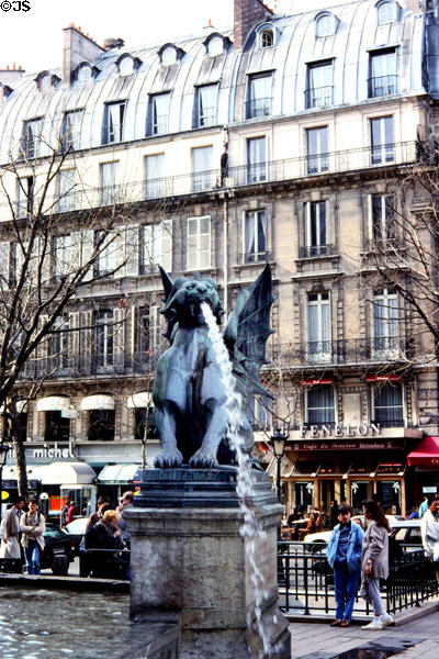 Winged dragon spouting water (1860) by Henri Alfred Jacquemart at St-Michel Fountain. Paris, France.