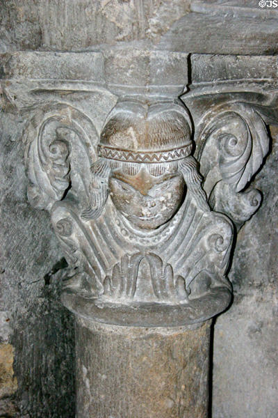 Unpainted carved column capital at St-Germain-des-Prés. Paris, France.