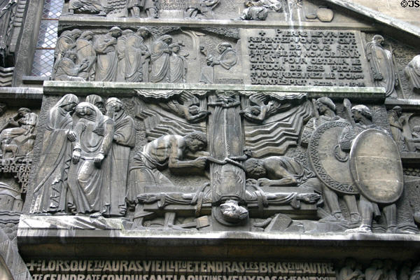 Art Deco carving of St Peter crucified upside-down at St Pierre de Chaillot. Paris, France.